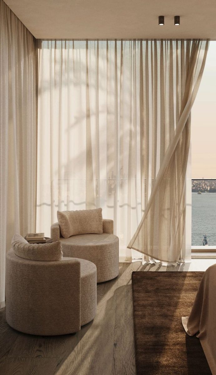 Sitting room with sheer curtains and coastal light