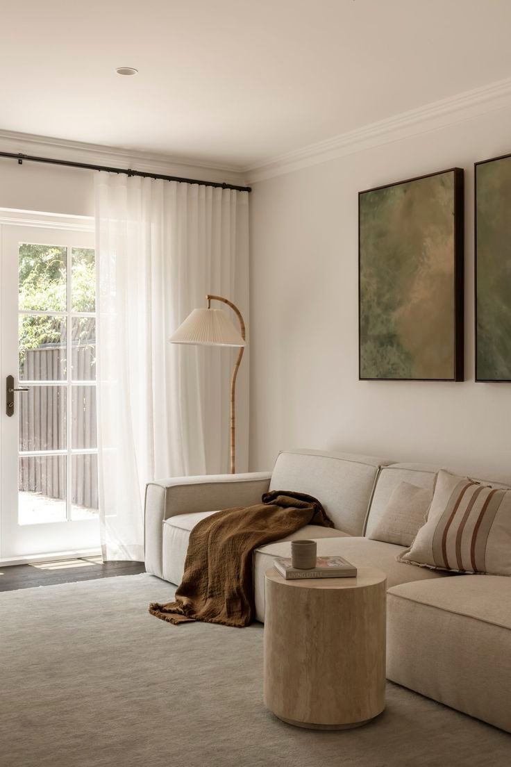 Living room with framed art and timber joinery